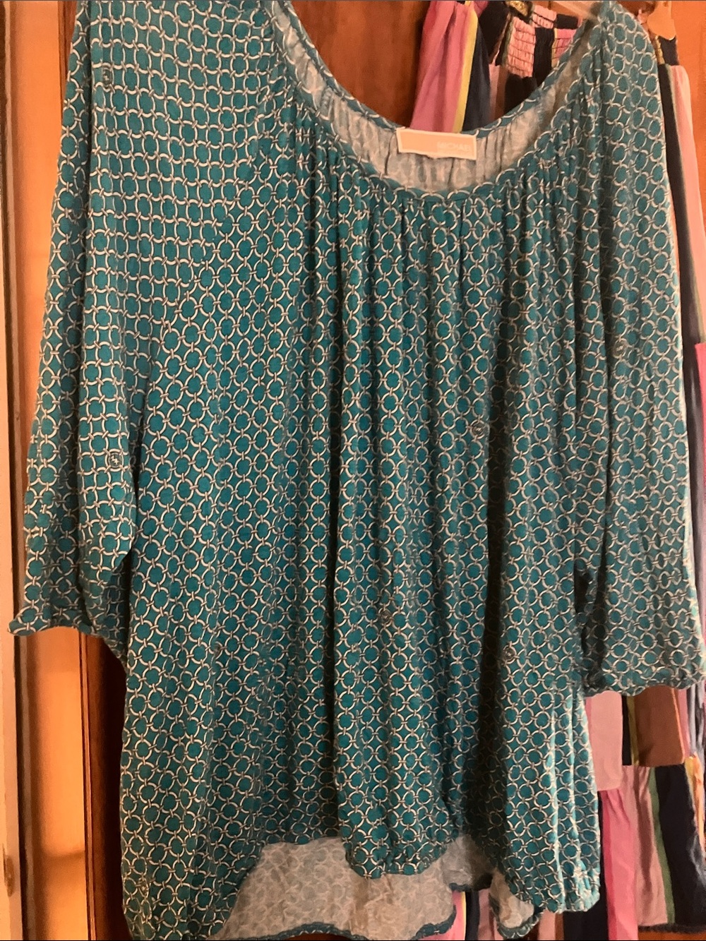Michael Kors top, turquoise with chain design print, half sleeves, low neck